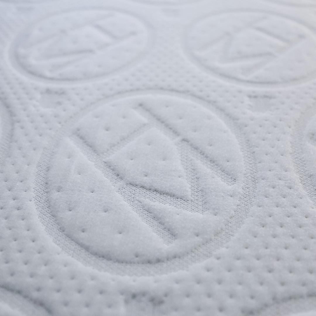 Close up of Haven Mattress with embossed logo